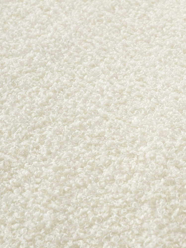 Catherine Lansfield Cosy Boucle Soft and Warm V-Shaped Cushion - Image 4 of 4