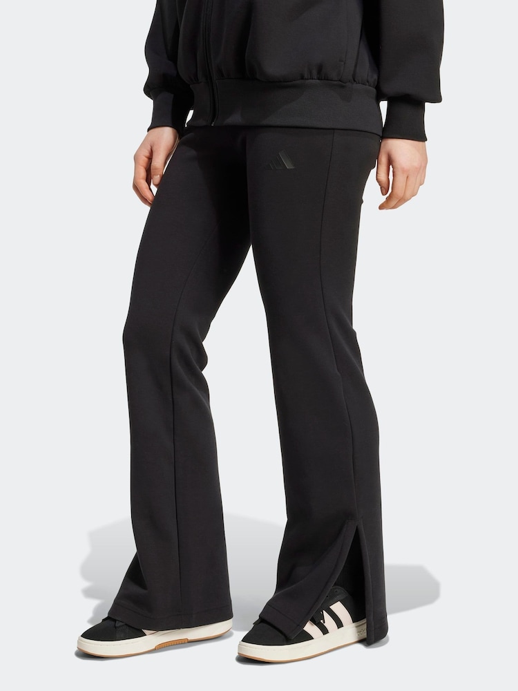 adidas Black Soft Lux Flared Tracksuit Bottoms - Image 1 of 7 adidas Black Soft Lux Flared Tracksuit Bottoms - Image 1 of 7