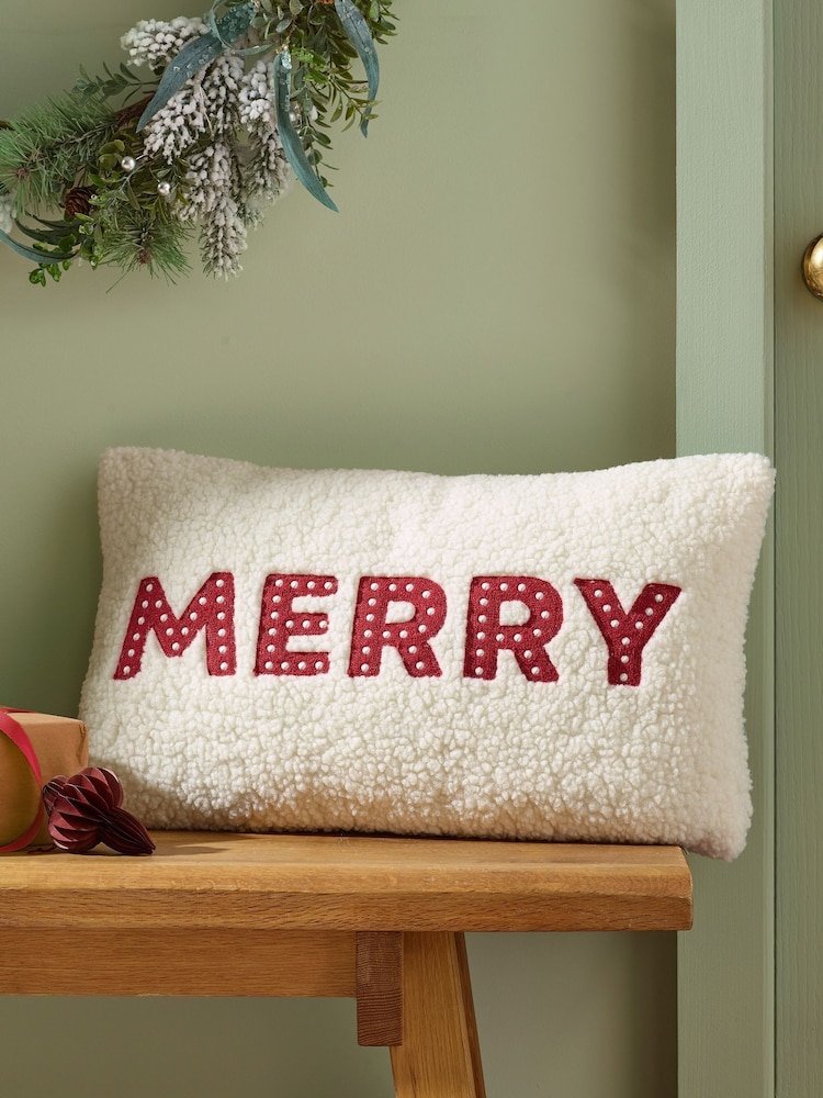 Catherine Lansfield Red Merry Christmas Boucle Cushion - Image 1 of 2