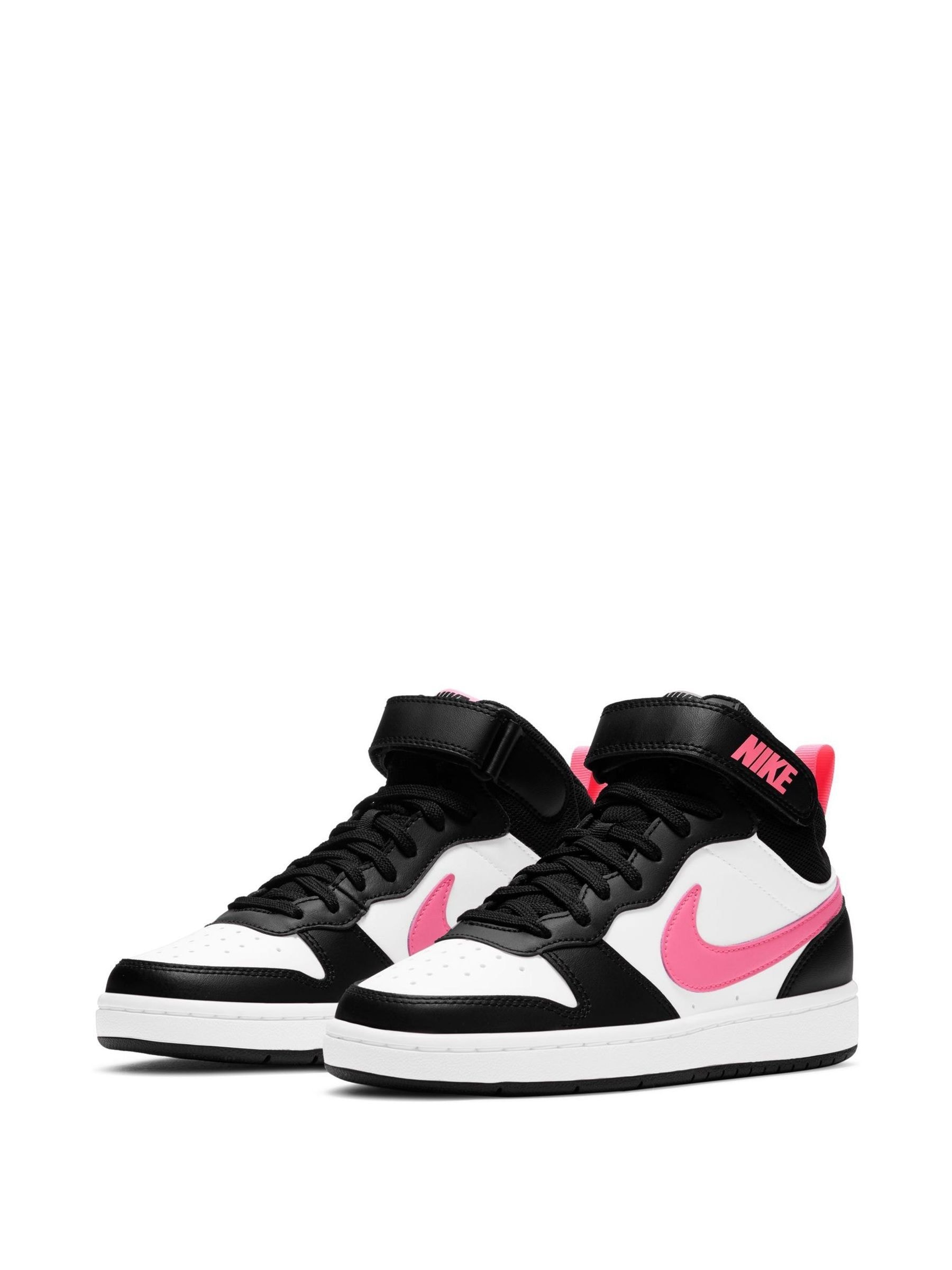 pink and white nike high tops