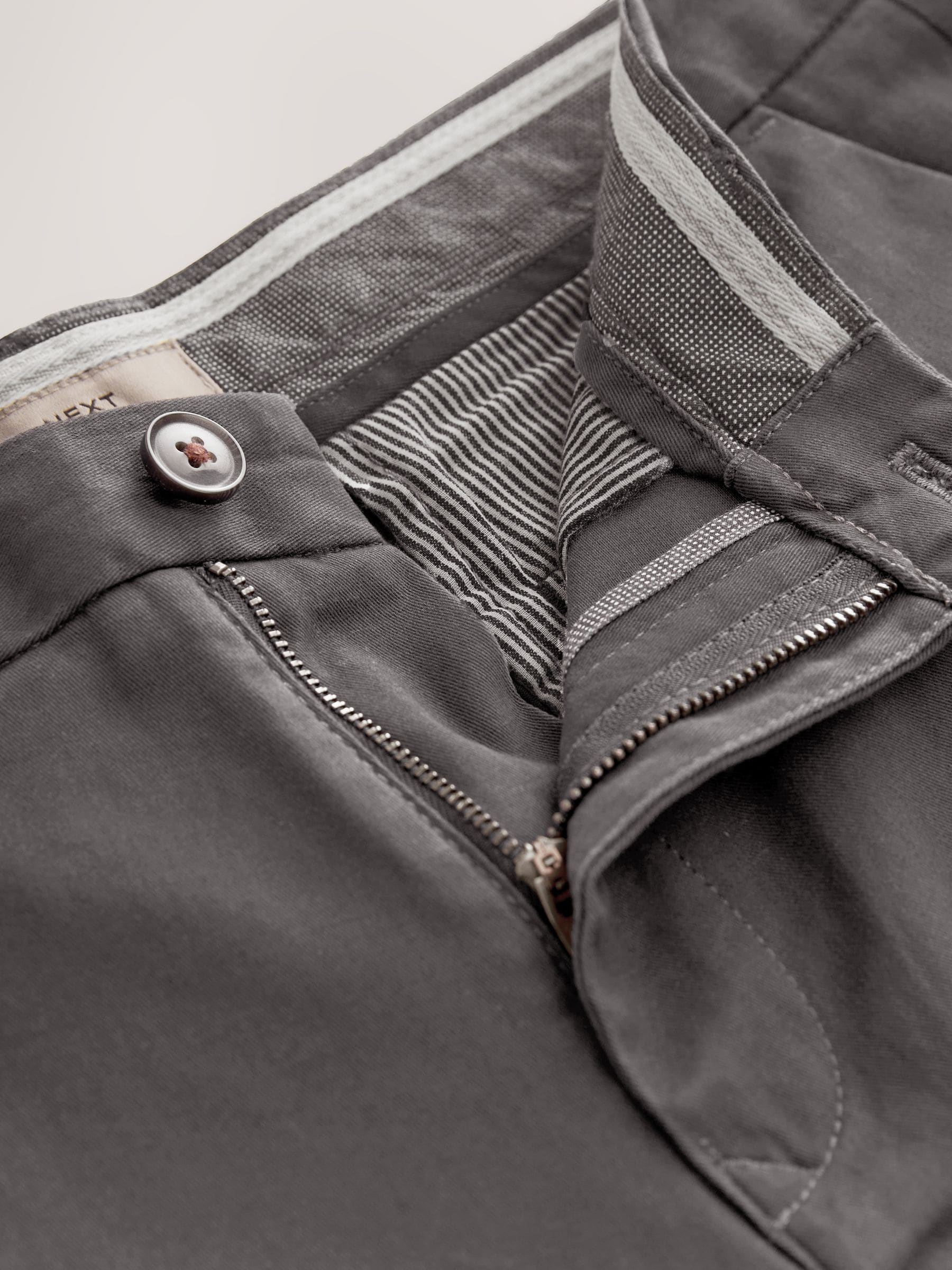 Buy Grey Dark Skinny Fit Stretch Chinos Trousers from Next USA