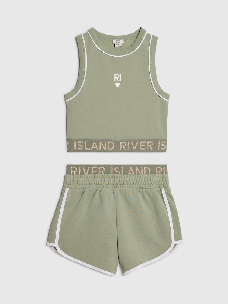 Conjunto de camiseta sin mangas con cintura elástica y pantalones cortos deportivos de River Island - Imagen 1 de 4 Conjunto de camiseta sin mangas con cintura elástica y pantalones cortos deportivos de River Island - Imagen 1 de 4