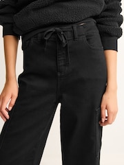 Schwarz - Bequeme, gebürstete Denim-Hose mit weitem Bein - Bild 5 von 7