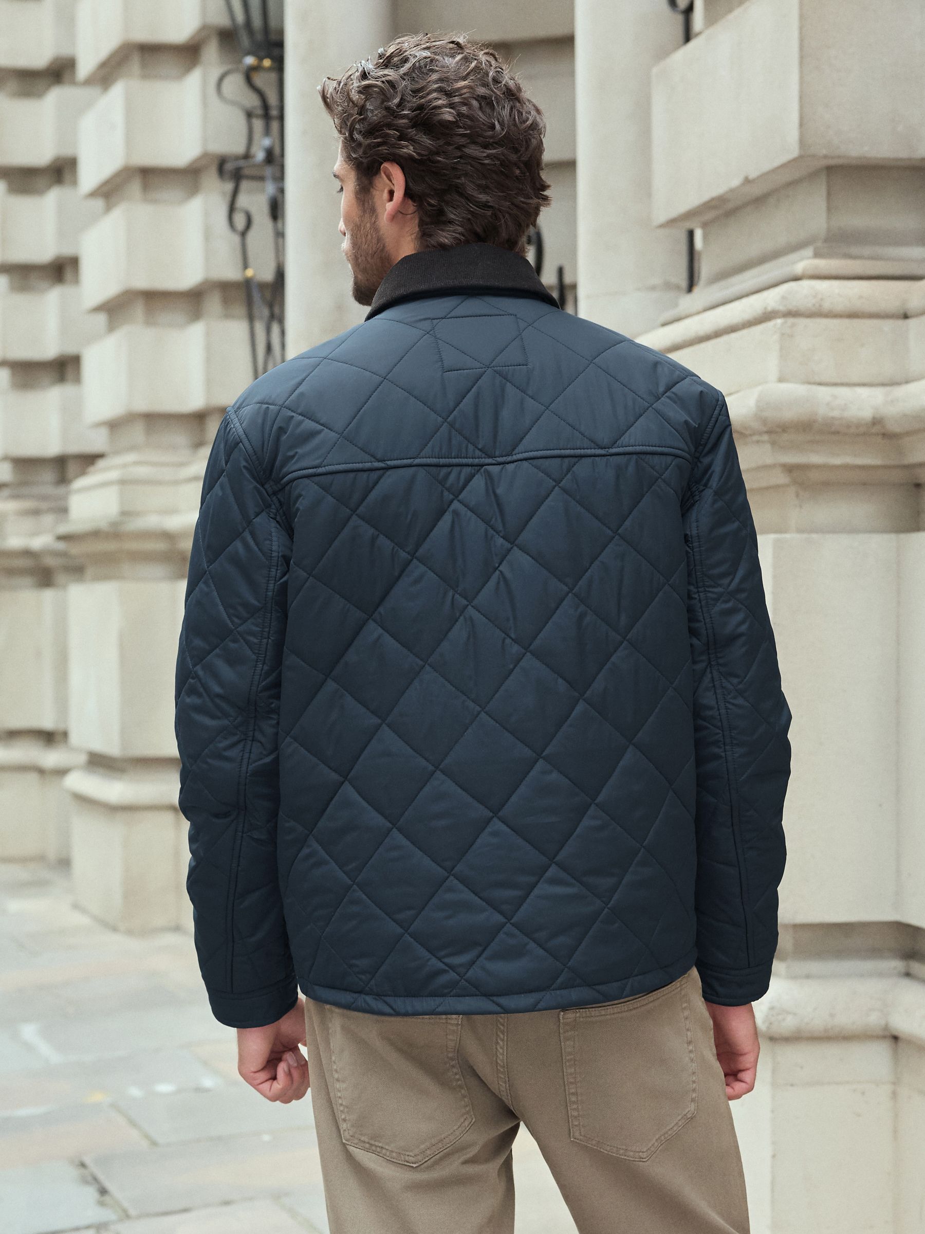 Navy blue quilted coat sale