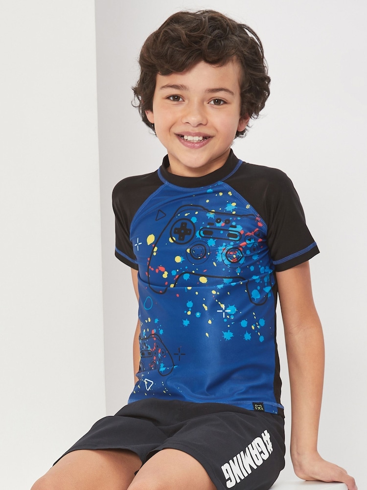 Conjunto de dos piezas de blusa y pantalón corto con diseño de videojuegos de Harry Bear - Imagen 2 de 4 Conjunto de dos piezas de blusa y pantalón corto con diseño de videojuegos de Harry Bear - Imagen 2 de 4