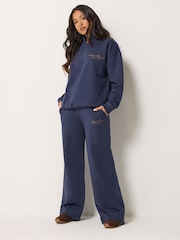 PixieGirl Petite Blue Etienne Slogan Wide Leg Joggers - Image 1 of 6