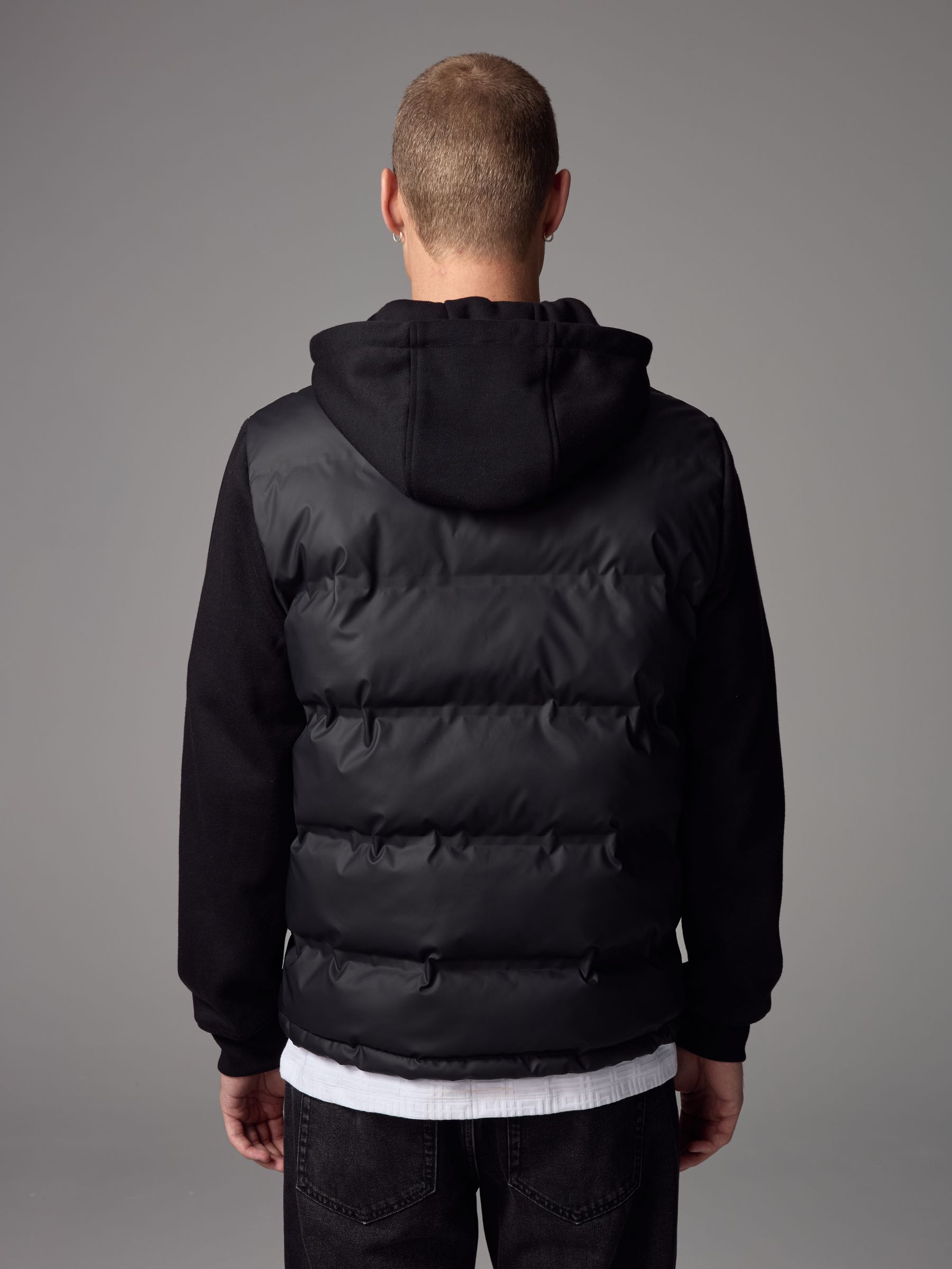Buy Black Jersey Sleeve Hybrid Puffer Jacket from Next USA