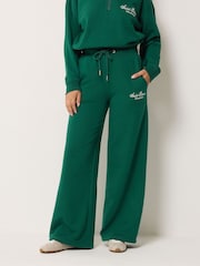 PixieGirl Petite Green Etienne Slogan Wide Leg Joggers - Image 2 of 6