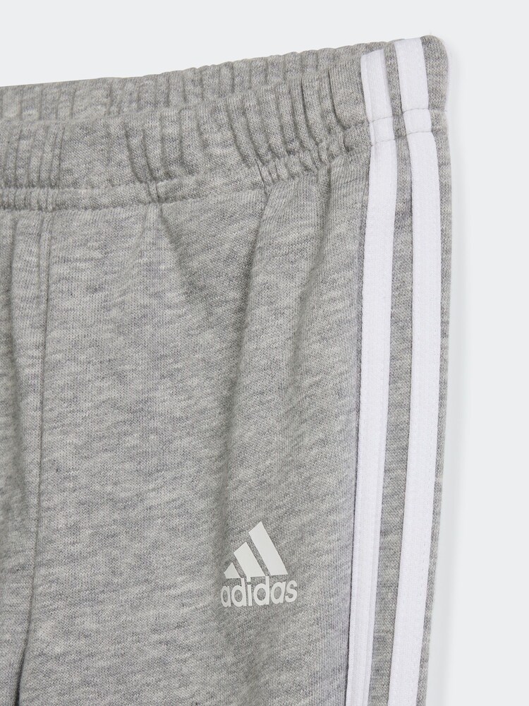 rožnata/siva - adidas Kids Essentials 3-črtast; progast trenirka - Slika 6 iz 6 rožnata/siva - adidas Kids Essentials 3-črtast; progast trenirka - Slika 6 iz 6