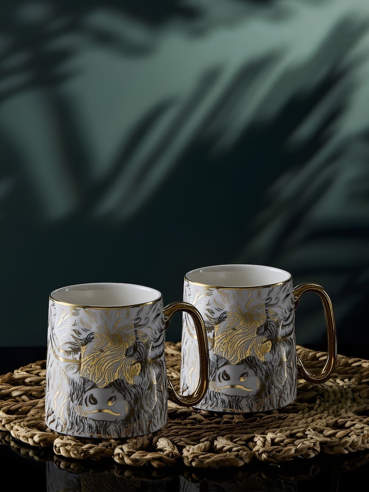 BIA International Set of 2 Gold Highland CowAnimal Mugs - Image 1 of 3 BIA International Set of 2 Gold Highland CowAnimal Mugs - Image 1 of 3