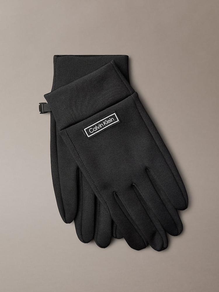 Calvin Klein Black Technical Stretch Touchscreen Gloves - Image 1 of 4 Calvin Klein Black Technical Stretch Touchscreen Gloves - Image 1 of 4