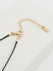 Gold Tone Wave Drop Black Cord Necklace Made with Recycled Metal - Image 4 of 4