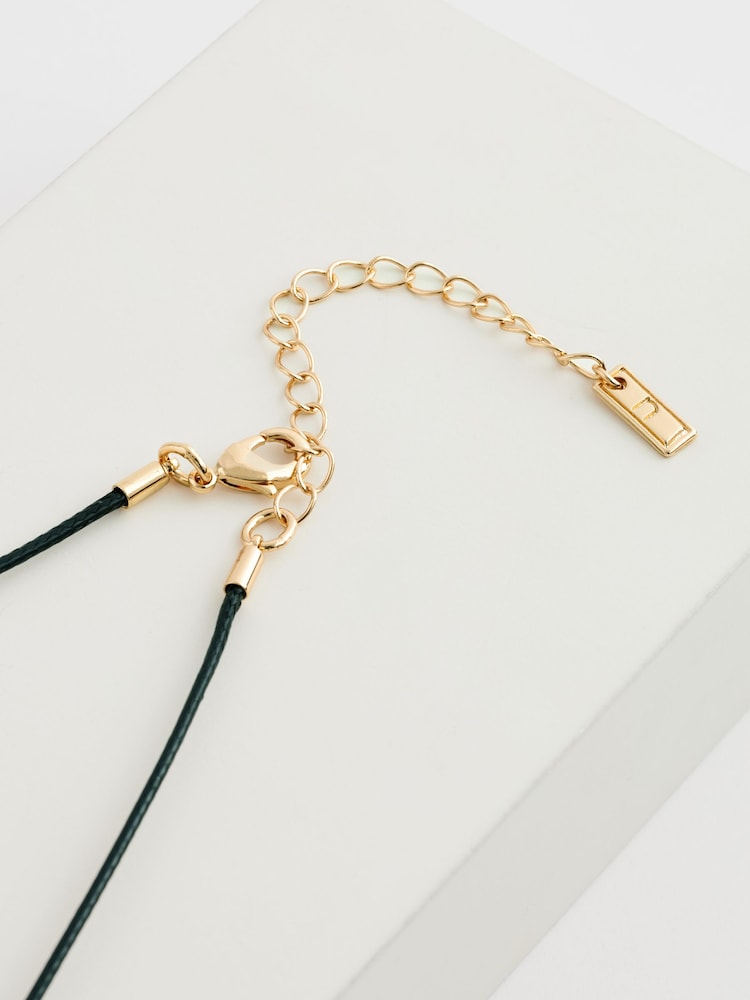 Gold Tone Wave Drop Black Cord Necklace Made with Recycled Metal - Image 4 of 4