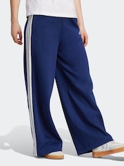 Pantalones anchos de felpa con rayas adidas 3 - Imagen 2 de 6
