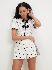 River Island Cream Polka Dot Bow Front Playsuit - Image 3 of 4