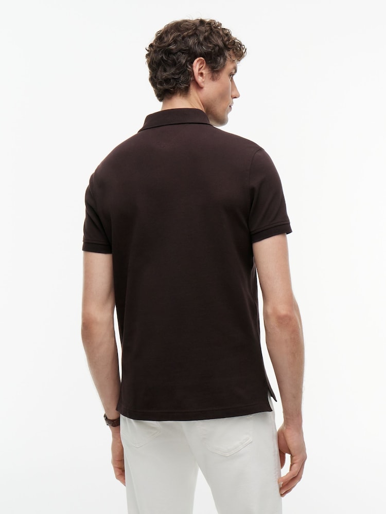 Marrón chocolate - Corte estándar - Polo de piqué 1985 de Tommy Hilfiger - Imagen 2 de 5 Marrón chocolate - Corte estándar - Polo de piqué 1985 de Tommy Hilfiger - Imagen 2 de 5