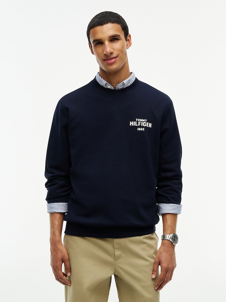 Tommy Hilfiger Blue 1985 Logo Terry Crew Neck Sweatshirt - Image 1 of 6 Tommy Hilfiger Blue 1985 Logo Terry Crew Neck Sweatshirt - Image 1 of 6