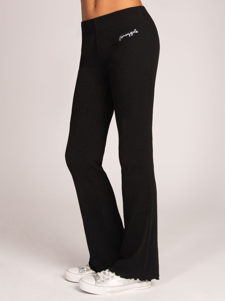 Pantalones legging acampanados con estampado de Pineapple y canalé - Imagen 1 de 6 Pantalones legging acampanados con estampado de Pineapple y canalé - Imagen 1 de 6