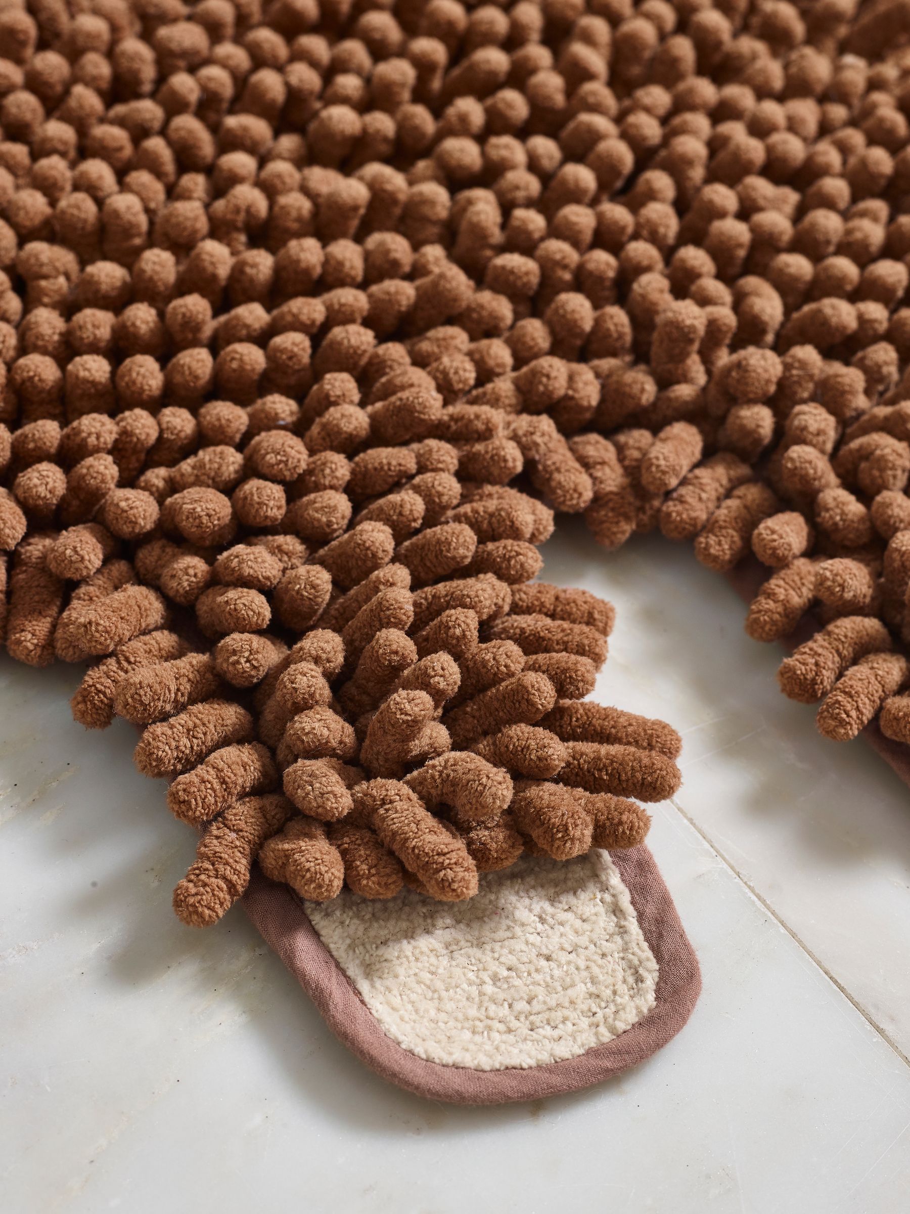 Buy Brown Hamish Plush Bobble Shaped Bath Mat from Next Saudi Arabia
