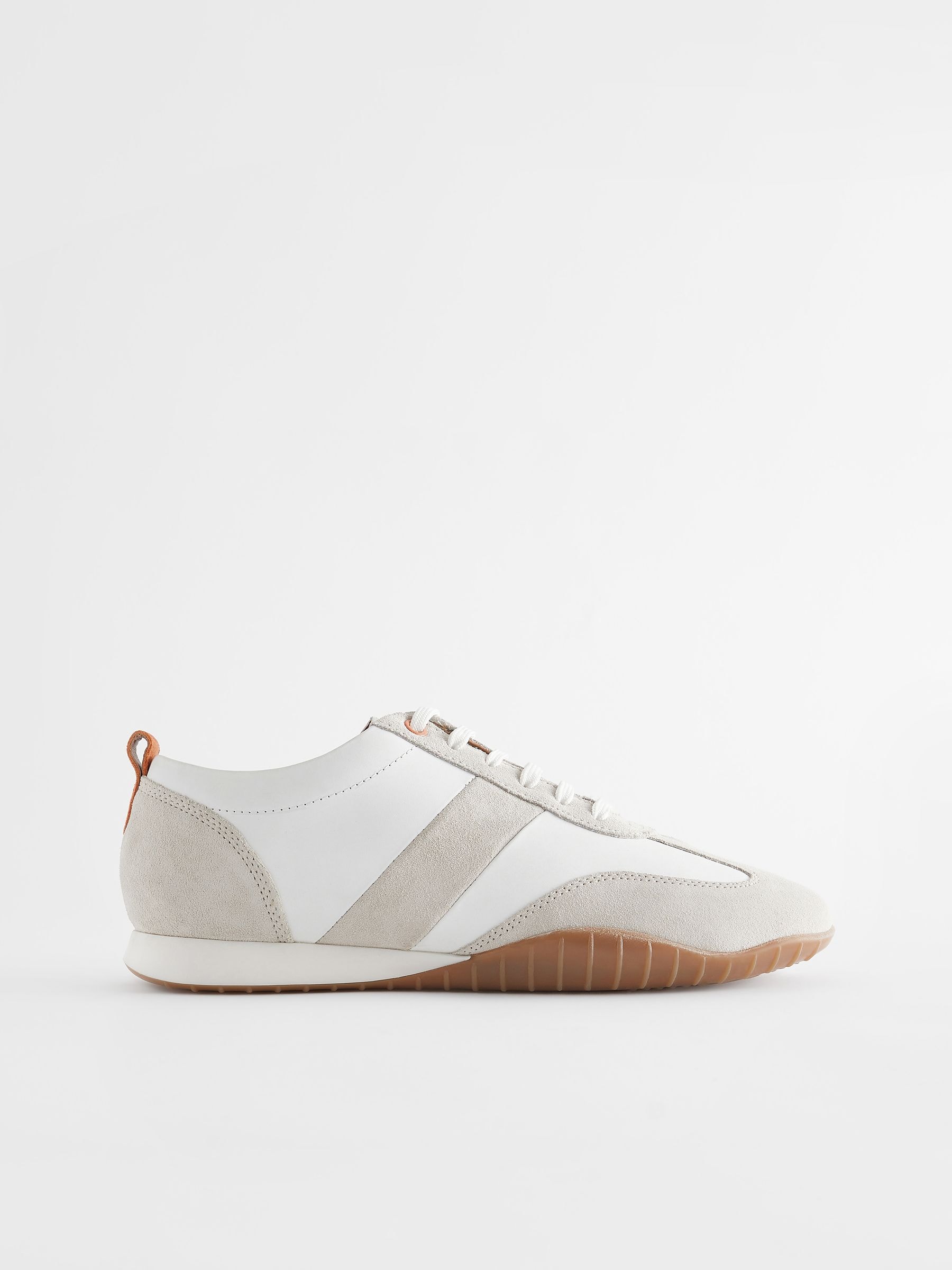 Slim white trainers store