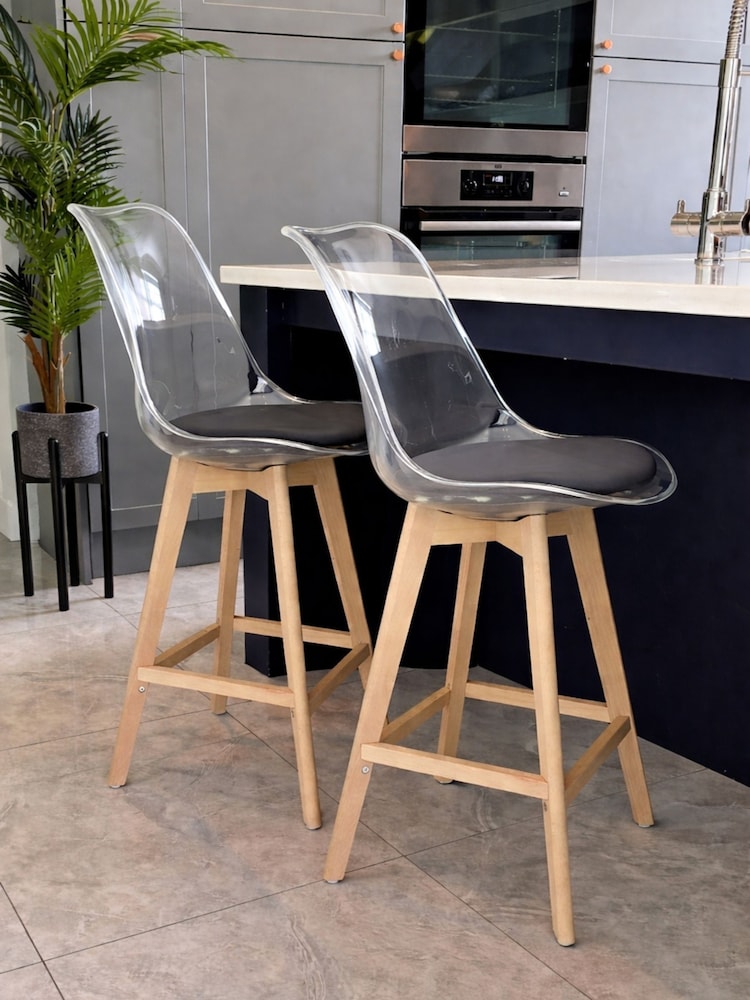 Fusion Living Set of 2 Dark Grey Soho Clear Plastic Bar Stools with Light Wood Legs - Image 1 of 5