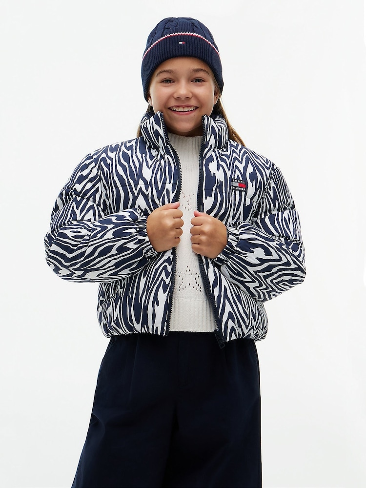 Tommy Hilfiger Blue Zebra Print Reversible Relaxed Puffer Jacket - Image 1 of 8 Tommy Hilfiger Blue Zebra Print Reversible Relaxed Puffer Jacket - Image 1 of 8