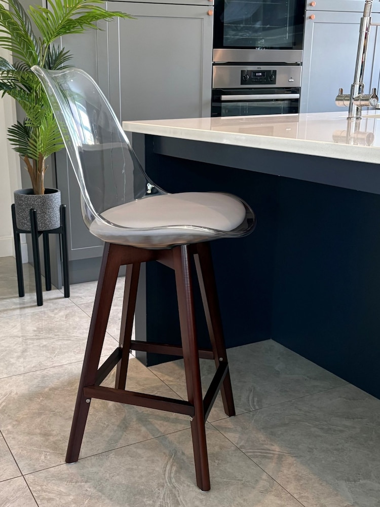 Fusion Living Light Grey Soho Clear Plastic Bar Stool with Dark Wood Legs - Image 1 of 5