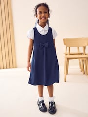 Navy Jersey Stretch Bow School Pinafore (3-14yrs) - Image 1 of 7