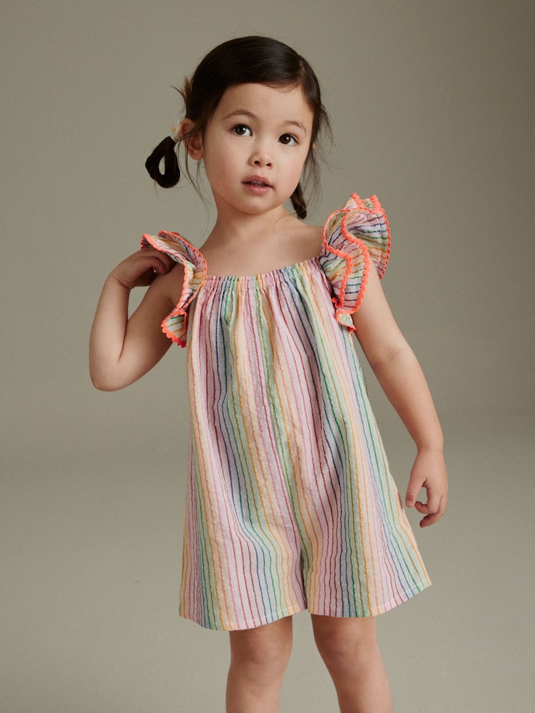 Multi 100% Cotton Rainbow Playsuit (3mths-7yrs) - Image 1 of 6 Multi 100% Cotton Rainbow Playsuit (3mths-7yrs) - Image 1 of 6