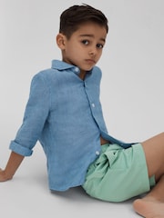 Agua - Shorts de baño lisos con cordón ajustable en la cintura Shore de Reiss - Imagen 1 de 4