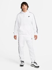 Trenirke s kapuco iz flisa Nike Club - Slika 1 iz 3