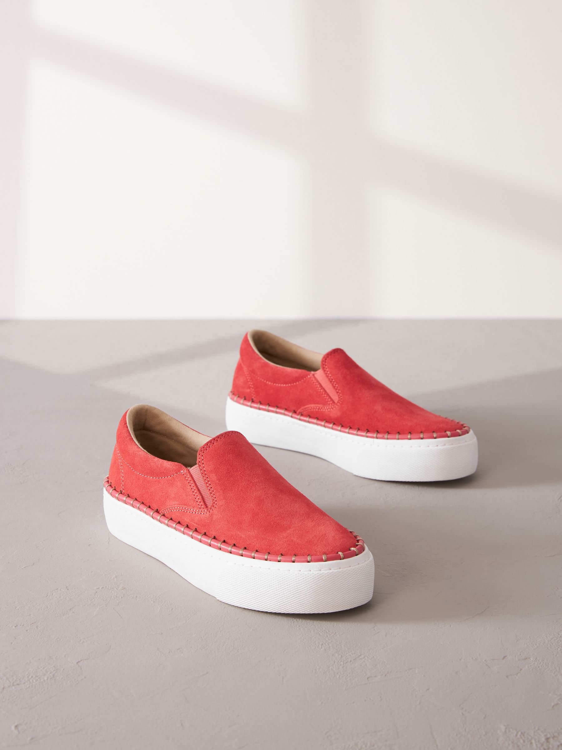 Buy Coral White Signature Leather Rand Stitch Detail Slip On Trainers from Next Luxembourg