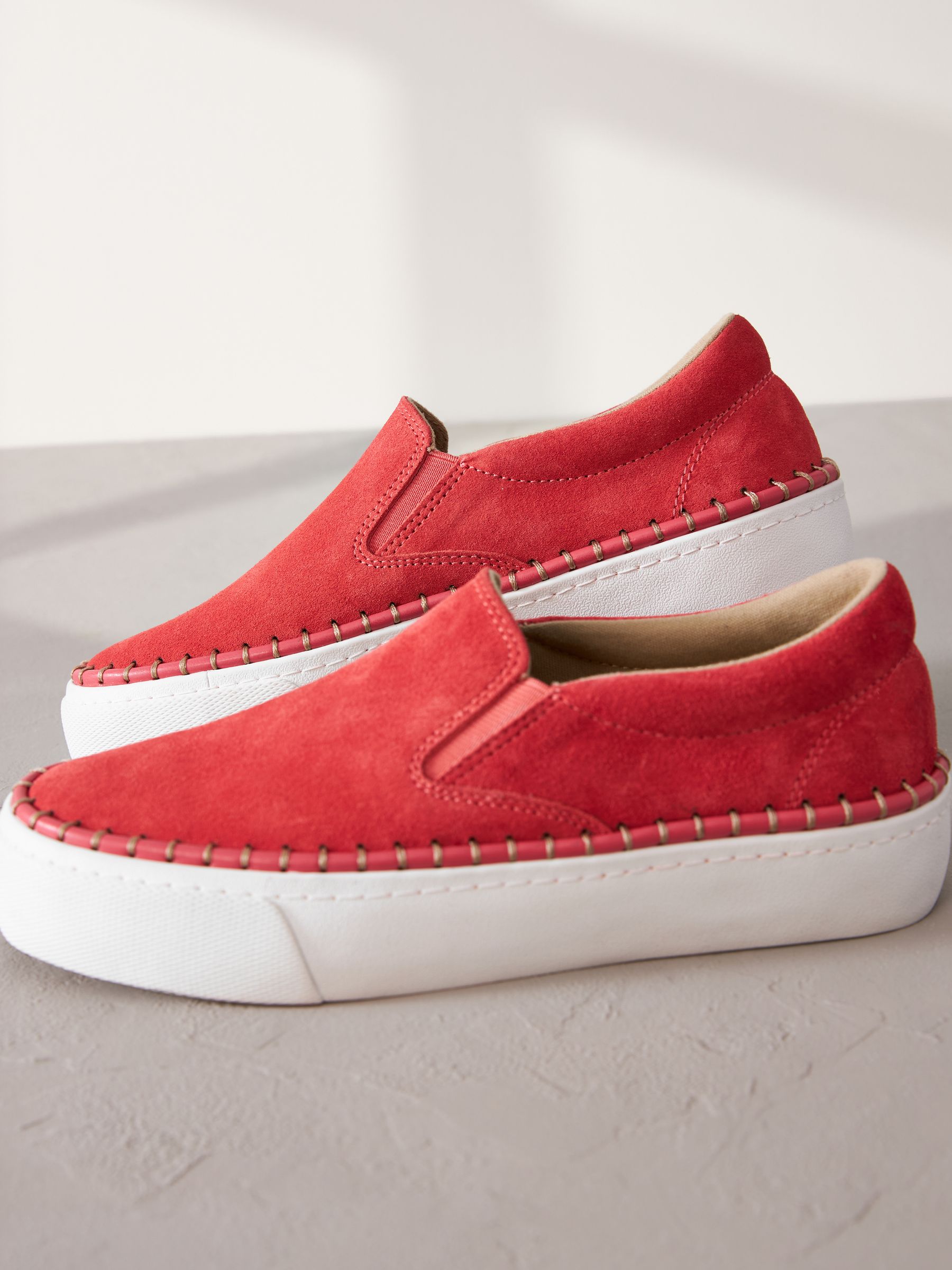 Buy Coral White Signature Leather Rand Stitch Detail Slip On Trainers from Next Luxembourg