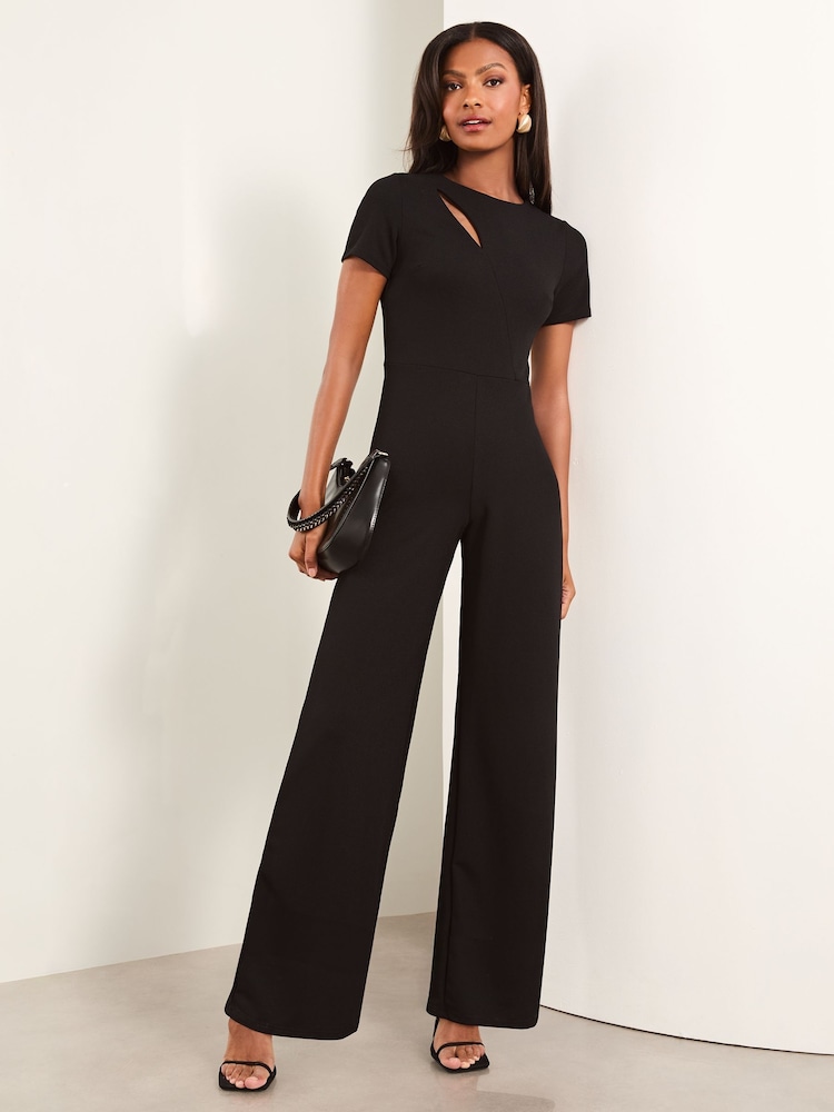 Lipsy Black Short Sleeve Splice Jumpsuit - Image 1 of 4 Lipsy Black Short Sleeve Splice Jumpsuit - Image 1 of 4