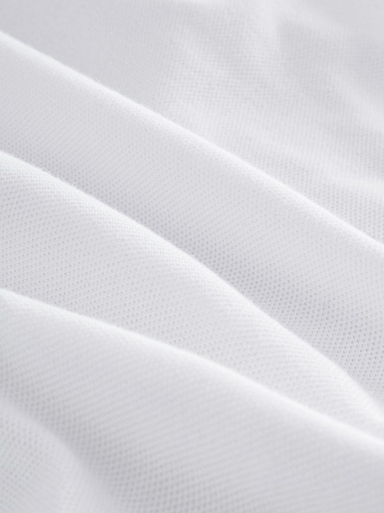 أبيض - قميص بولو بأكمام قصيرة (من 3 إلى 16 سنةً) - صورة 5 من 5 أبيض - قميص بولو بأكمام قصيرة (من 3 إلى 16 سنةً) - صورة 5 من 5