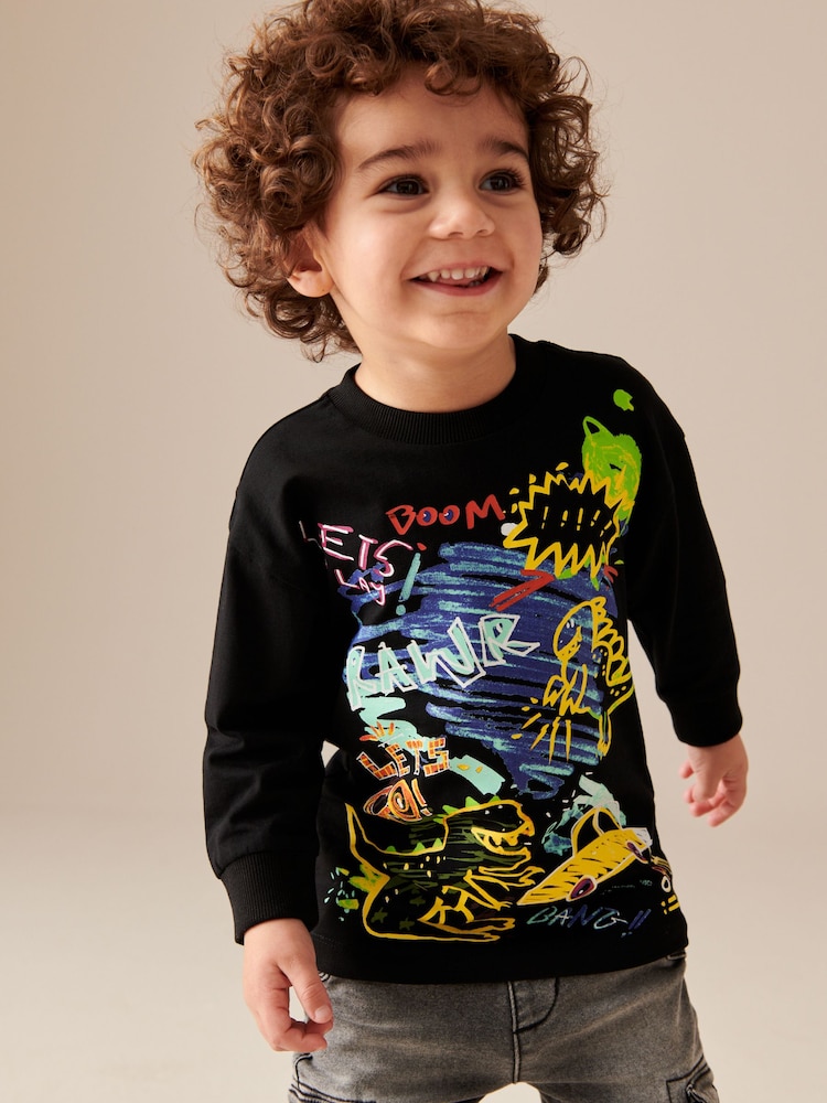 Black Dino Print Long Sleeve Graffiti 100% Cotton T-Shirt (3mths-7yrs) - Image 1 of 5