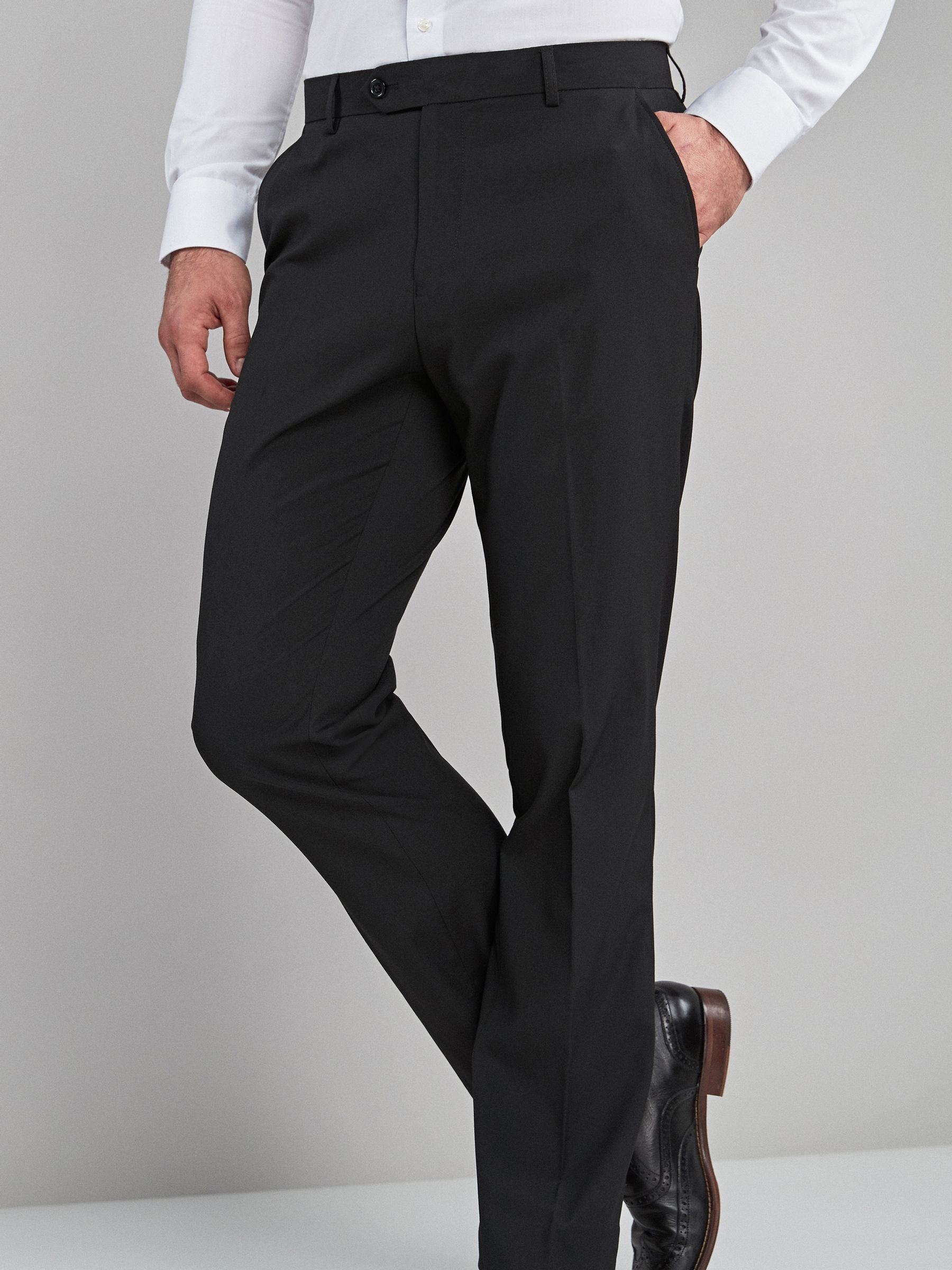 Buy Black Regular Fit Stretch Smart Trousers from the Next UK online shop