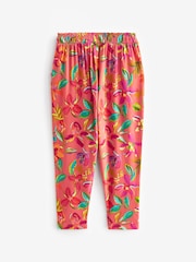 Rostrot-Orange/Rosa mit tropischem Blumenprint - Leichte Jerseyhose mit Stretch (3–16 Jahre) - Bild 5 von 6