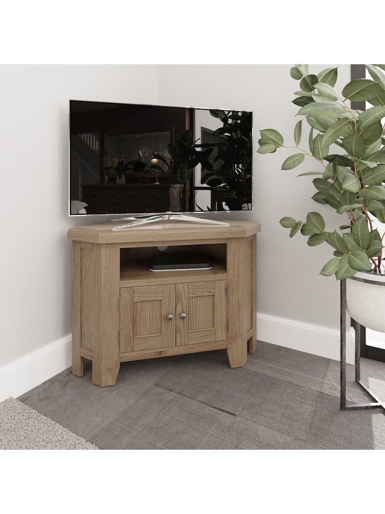 K Interiors Smoked Oak Embleton Solid Wood Corner TV Unit - Image 1 of 6