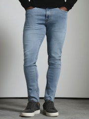 Vaqueros elásticos de corte muscle fit de Tailored Athlete - Imagen 1 de 5