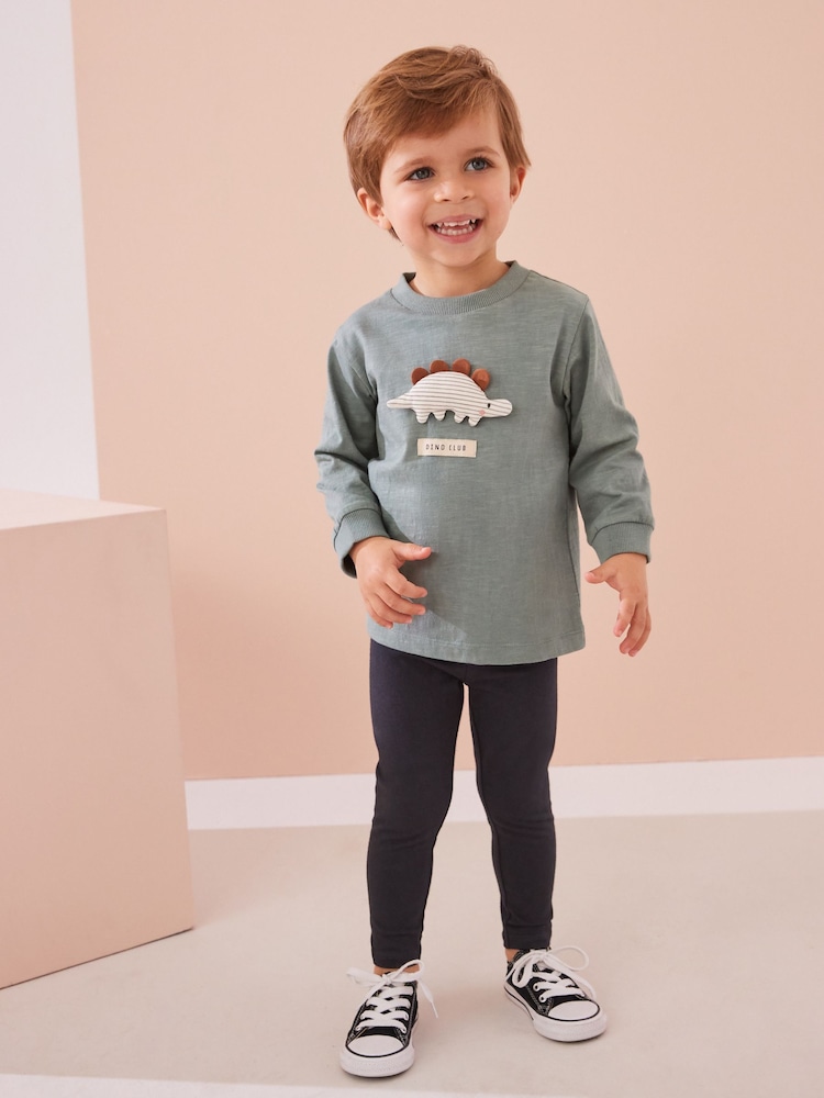Grün mit Dinosauriern - Set aus langärmligem Oberteil und Leggings aus 100 % Baumwolle (3Monate–7Jahre) - Bild 1 von 8 Grün mit Dinosauriern - Set aus langärmligem Oberteil und Leggings aus 100 % Baumwolle (3Monate–7Jahre) - Bild 1 von 8