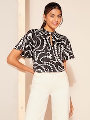 Friends Like These Black Spot Printed Flutter Sleeve Keyhole Blouse - Image 2 of 4
