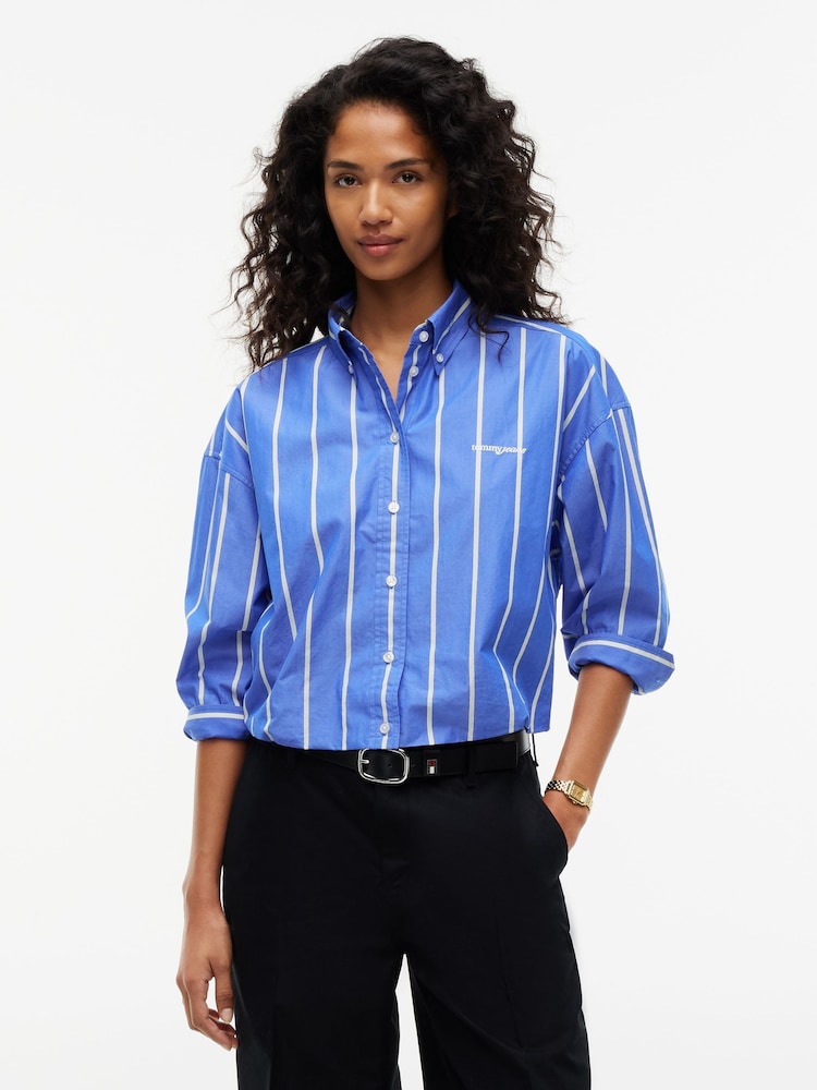 Tommy Jeans Blue Oversized Fit Cropped Gathered Poplin Shirt - Image 1 of 5 Tommy Jeans Blue Oversized Fit Cropped Gathered Poplin Shirt - Image 1 of 5