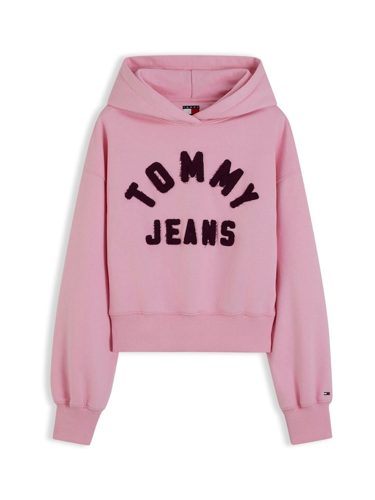 Tommy Jeans Light Pink Varsity Logo Oversized Fleece Hoodie - Image 1 of 4 Tommy Jeans Light Pink Varsity Logo Oversized Fleece Hoodie - Image 1 of 4