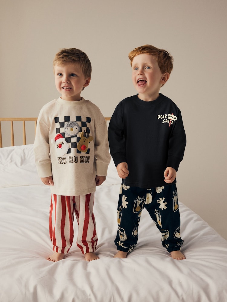 Red/Black Christmas Checkerboard 100% Cotton Oversized Pyjamas 2 Pack (9mths-12yrs) - Image 1 of 4