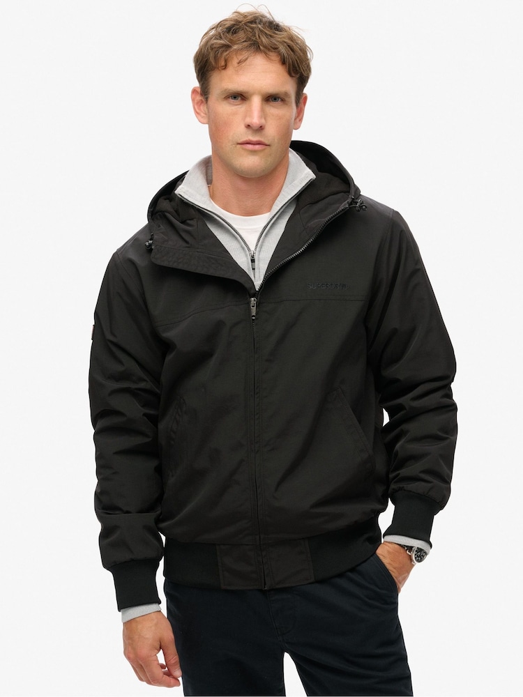 Superdry Black Surplus Nylon Hooded Bomber Jacket - Image 1 of 7
