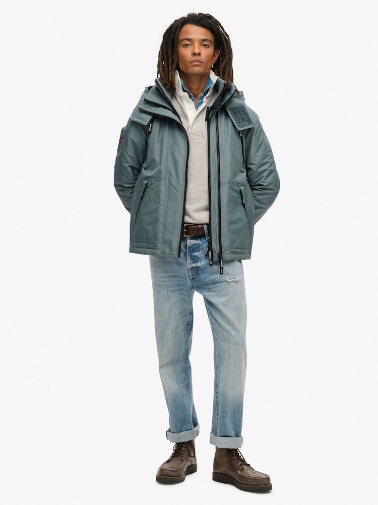 צבע כחול Stormy - Superdry ז'קט רוח עם קפוצ'ון, דגם Mountain - תמונה 1 מתוך 6 צבע כחול Stormy - Superdry ז'קט רוח עם קפוצ'ון, דגם Mountain - תמונה 1 מתוך 6
