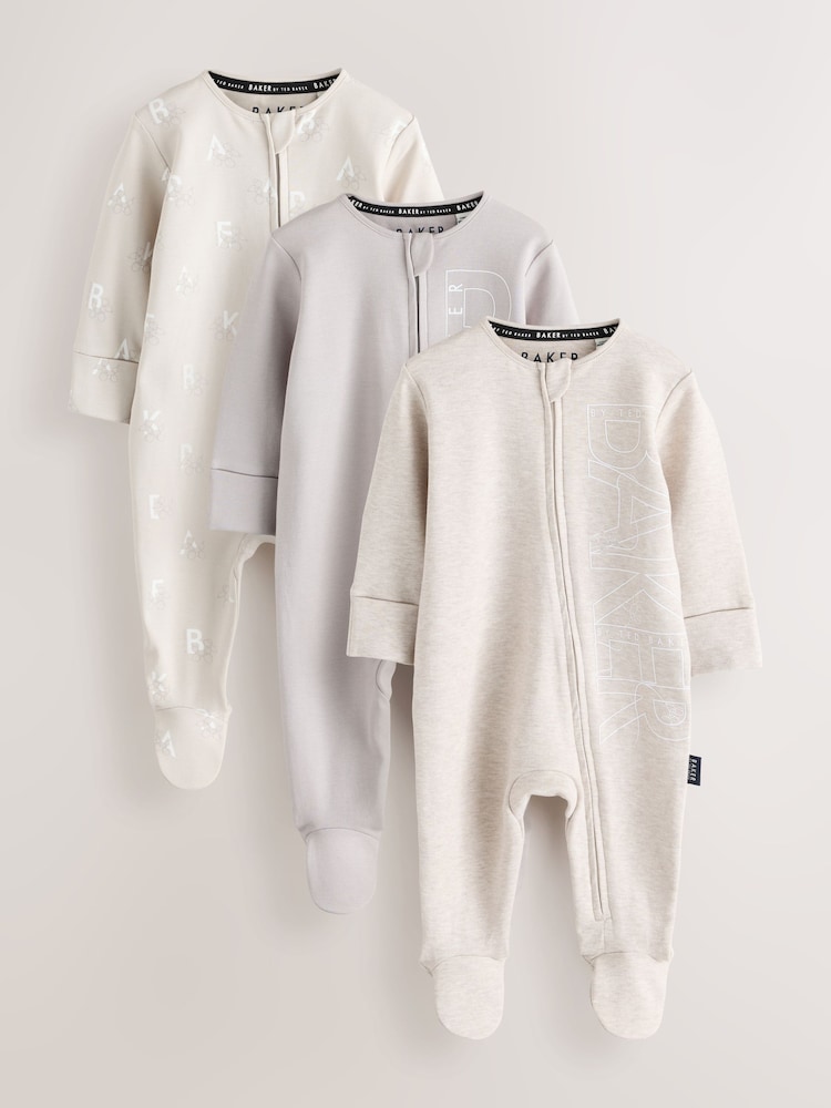 Baker by Ted Baker Neutral 3 Pack Sleepsuits - Image 1 of 10 Baker by Ted Baker Neutral 3 Pack Sleepsuits - Image 1 of 10