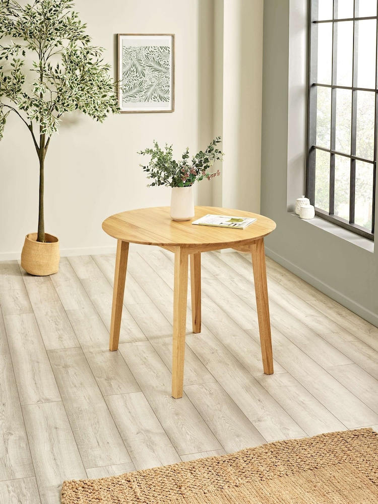 Julian Bowen Natural Oak Coast 90cm Round Dropleaf Dining Table - Image 1 of 12 Julian Bowen Natural Oak Coast 90cm Round Dropleaf Dining Table - Image 1 of 12