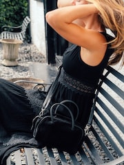 Negro - Bolso de noche pequeño de ante Faith de Pure Luxuries London - Imagen 2 de 8